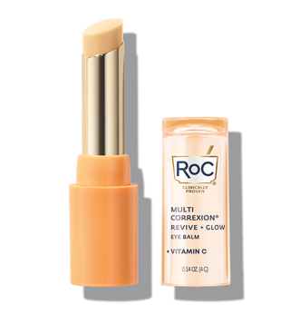 RoC Multi Correxion Revive + Glow Eye Balm with Vitamin C, shown with cap off to display the stick applicator.